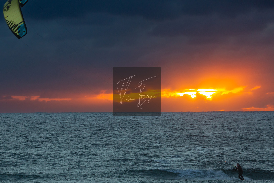 "Kiting in sunset" stock image