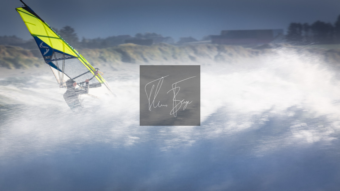 "Windsurfer in the whitewash" stock image