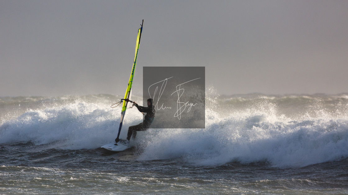 "Windsurfer in the sun" stock image