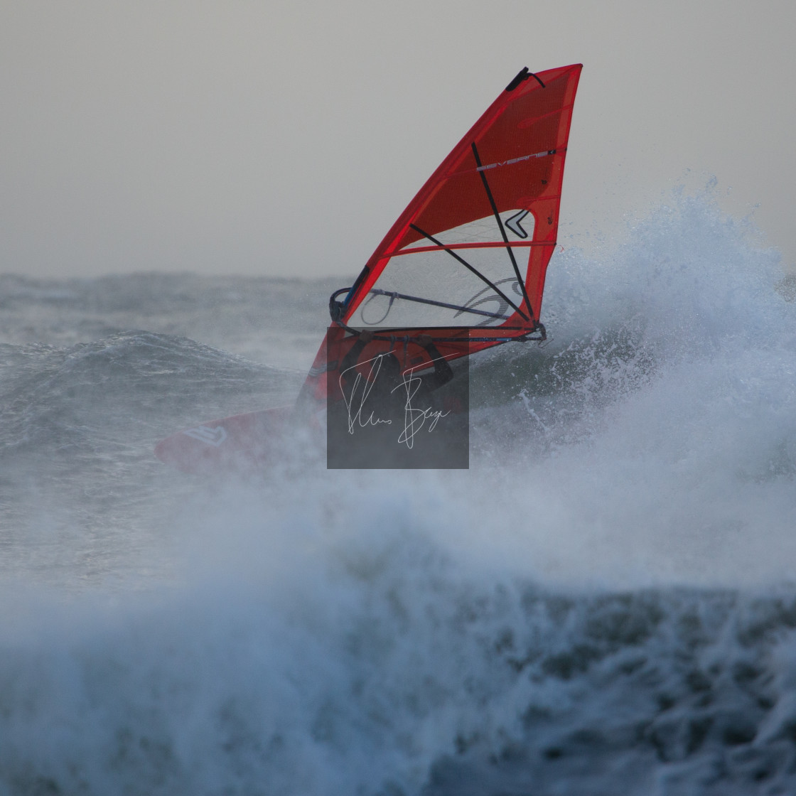 "Windsurfing in waves" stock image