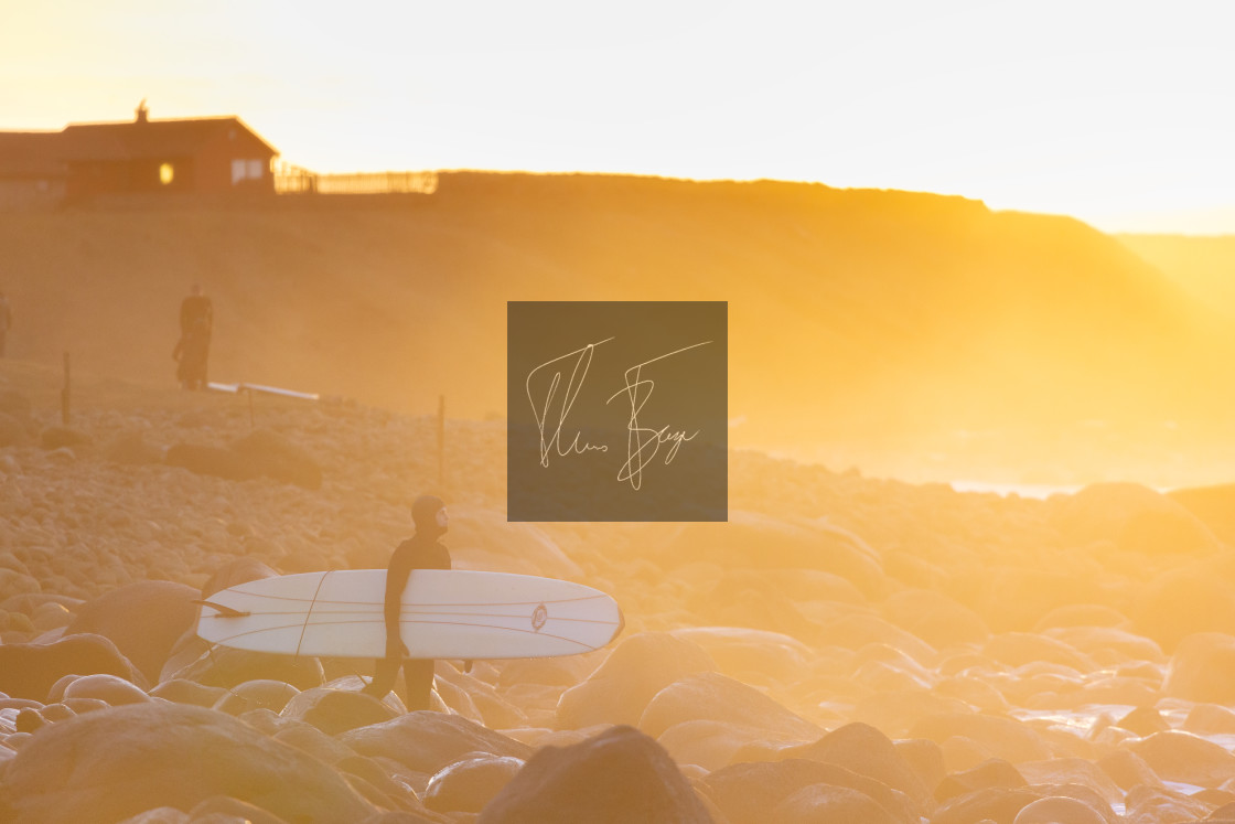 "Golden hour surf" stock image