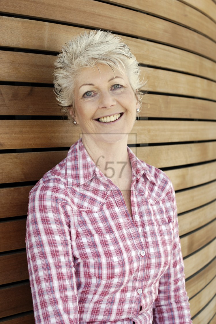 "Attractive mature woman with a healthy happy smile." stock image