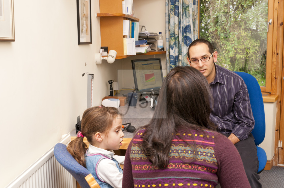 "GP Doctor surgery patient consultation UK" stock image