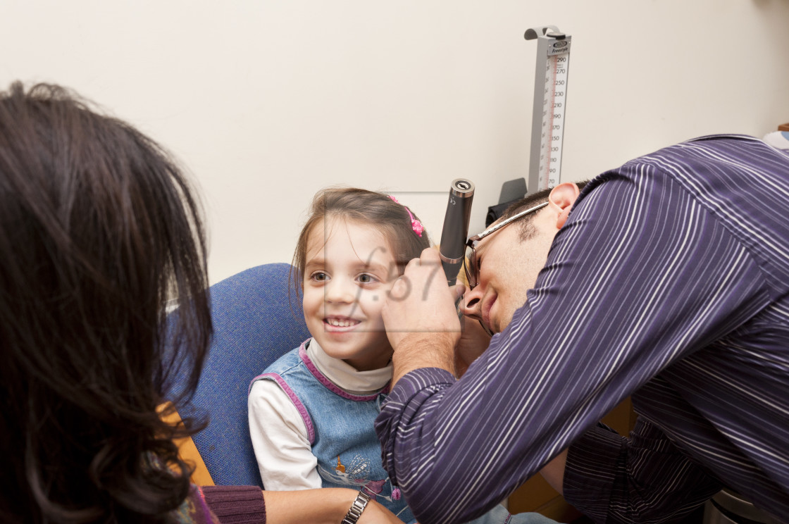 "GP Doctor surgery patient consultation UK" stock image