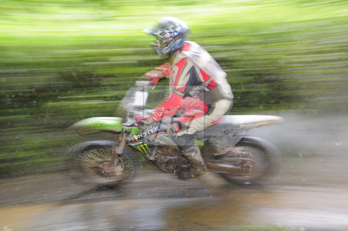 "Motocross rider in action" by HD57 lifestyle stock photography - $29.40 "Motocross rider in action" stock image