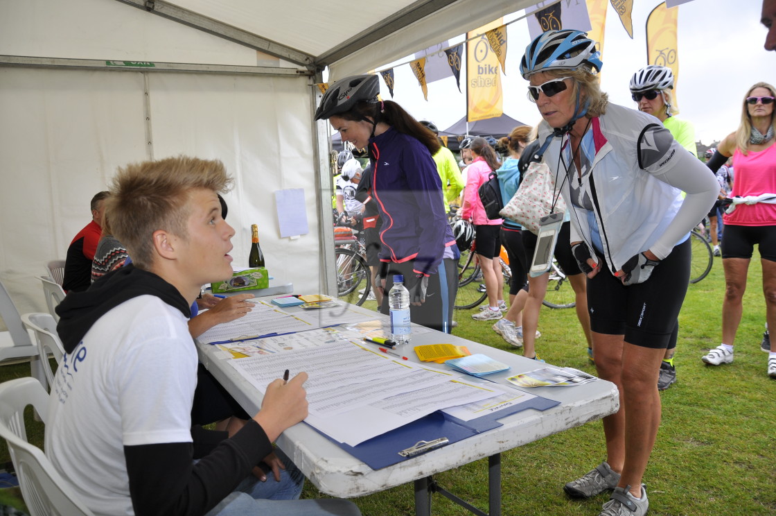 "Participants in cycle sportive registering at the event start" stock image