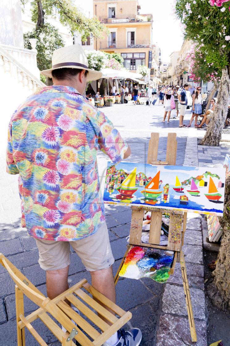 "street pavement artist Taormina Sicily" stock image