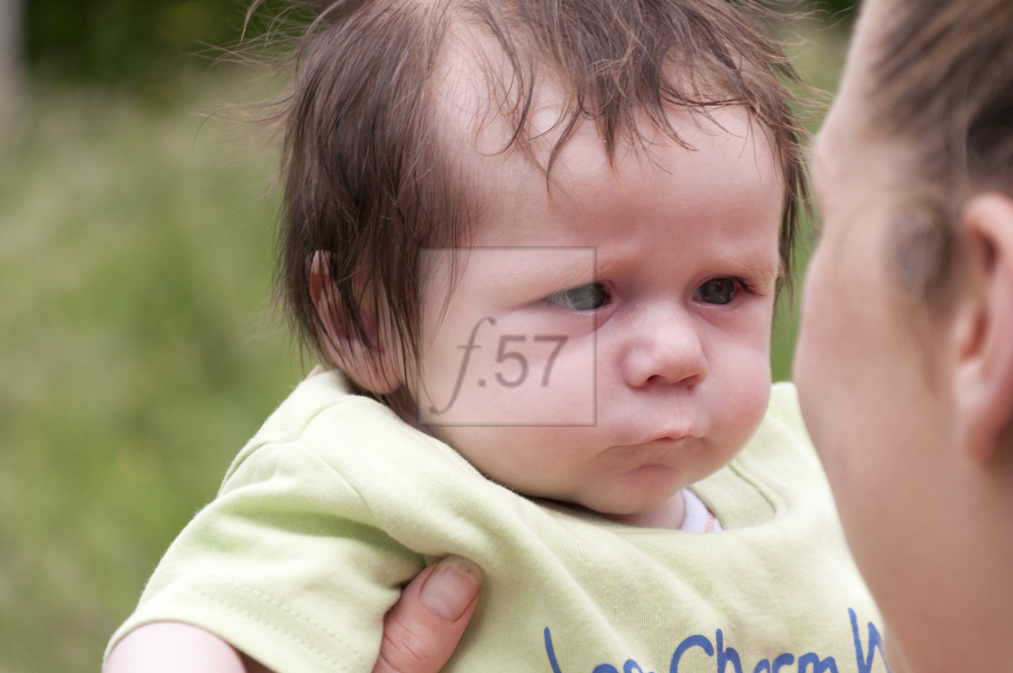 "Young mother with 9 week old baby boy." stock image