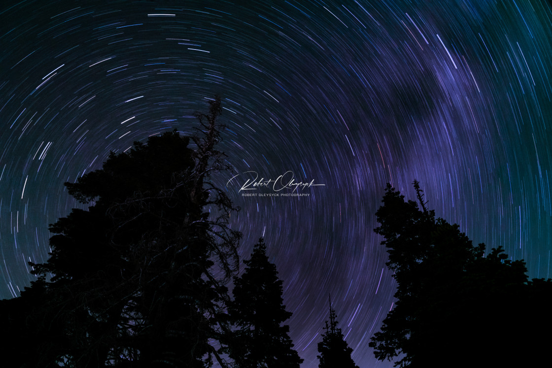 "Star Trails Over Lake Tahoe - Purple" stock image