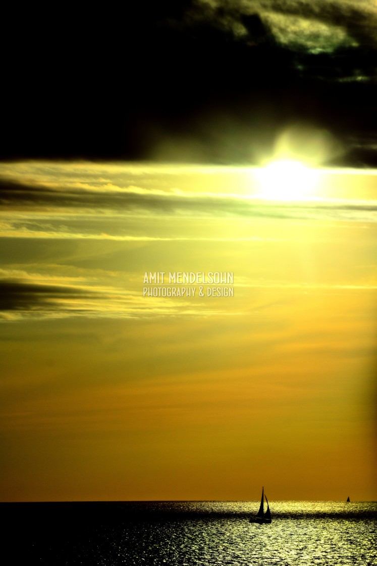 "Boat in the sunset" stock image