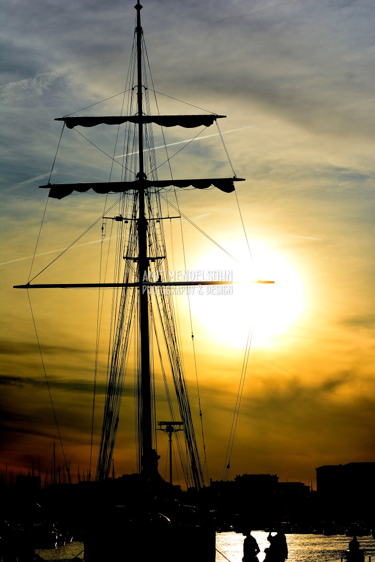 "Masts ship in the sunset" stock image