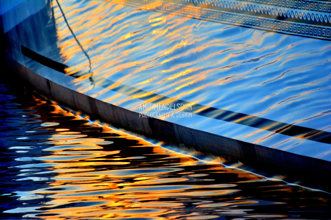 "Sunset reflecting on boat" stock image