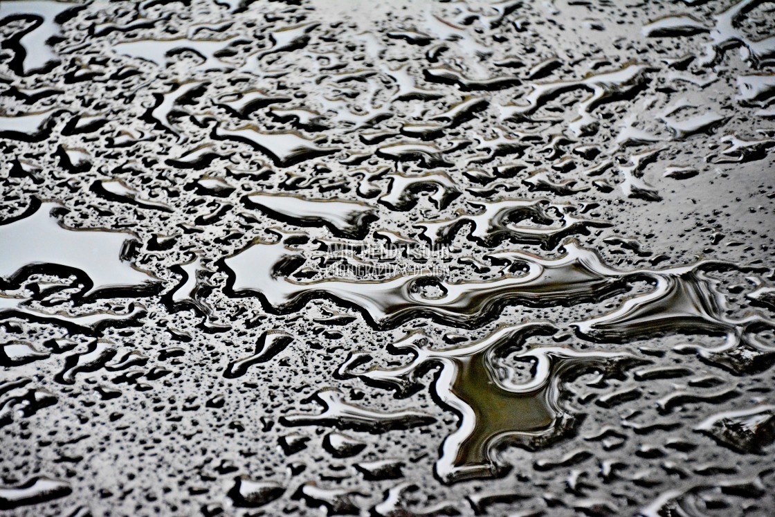 "Water on a metal surface" stock image