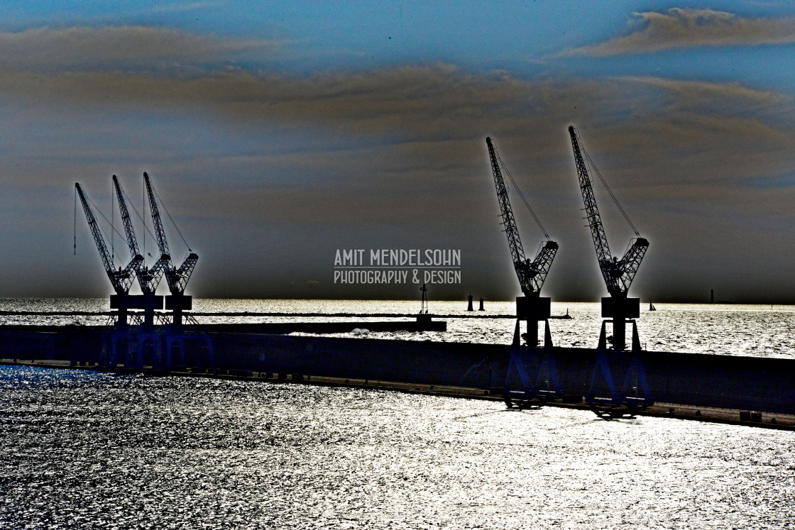 "5 cranes on the port of the ferry boats" stock image