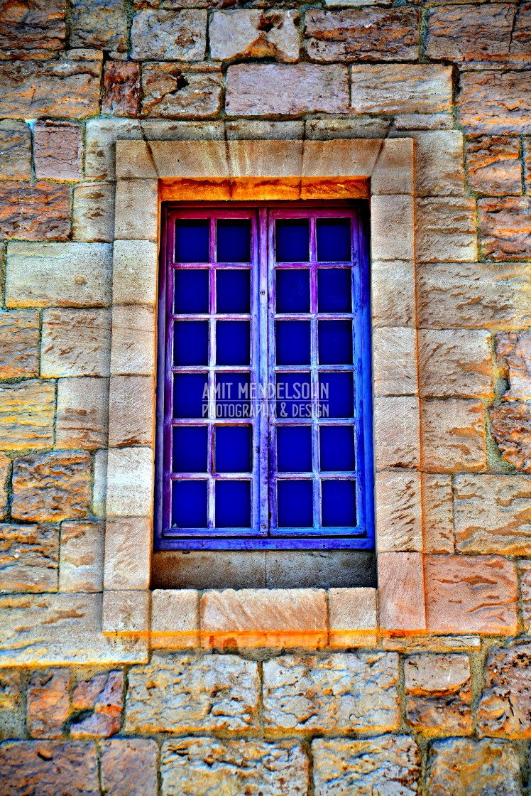 "A window in a stone building" stock image