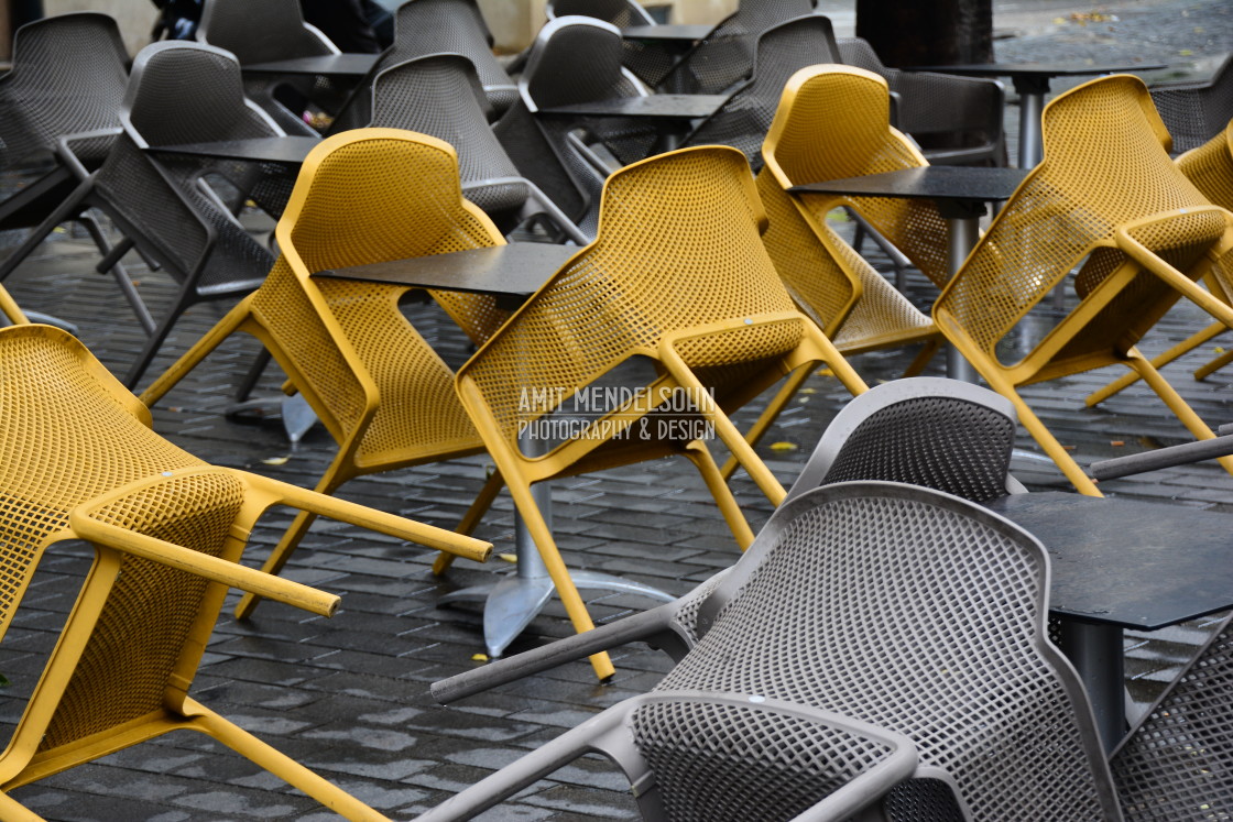 "Chairs and tables in the rain" stock image