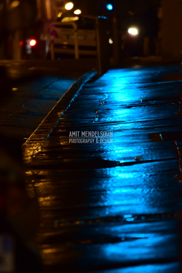 "Lights reflecting on a wet road" stock image