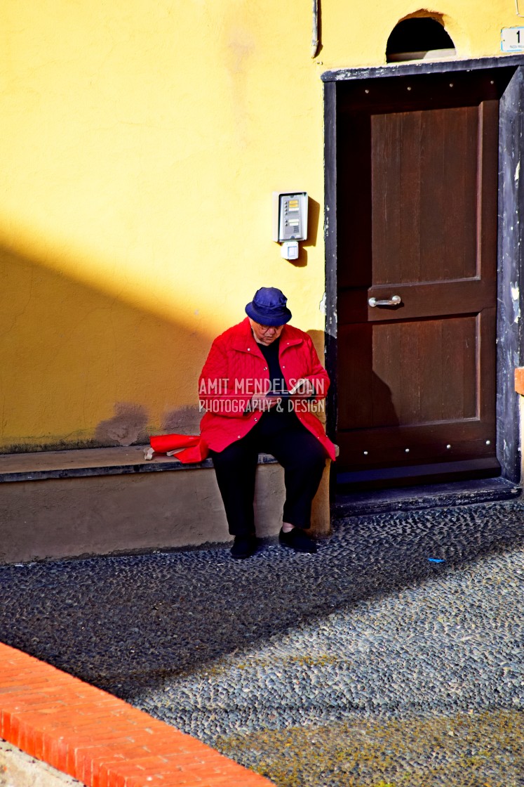 "A man reading in the street" stock image