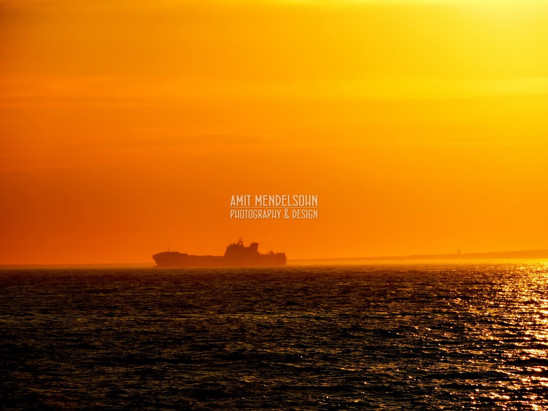 "A boat in the horizon" stock image