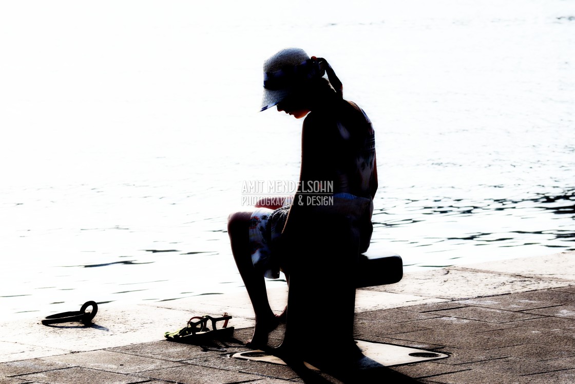 "A girl in front of the water" stock image