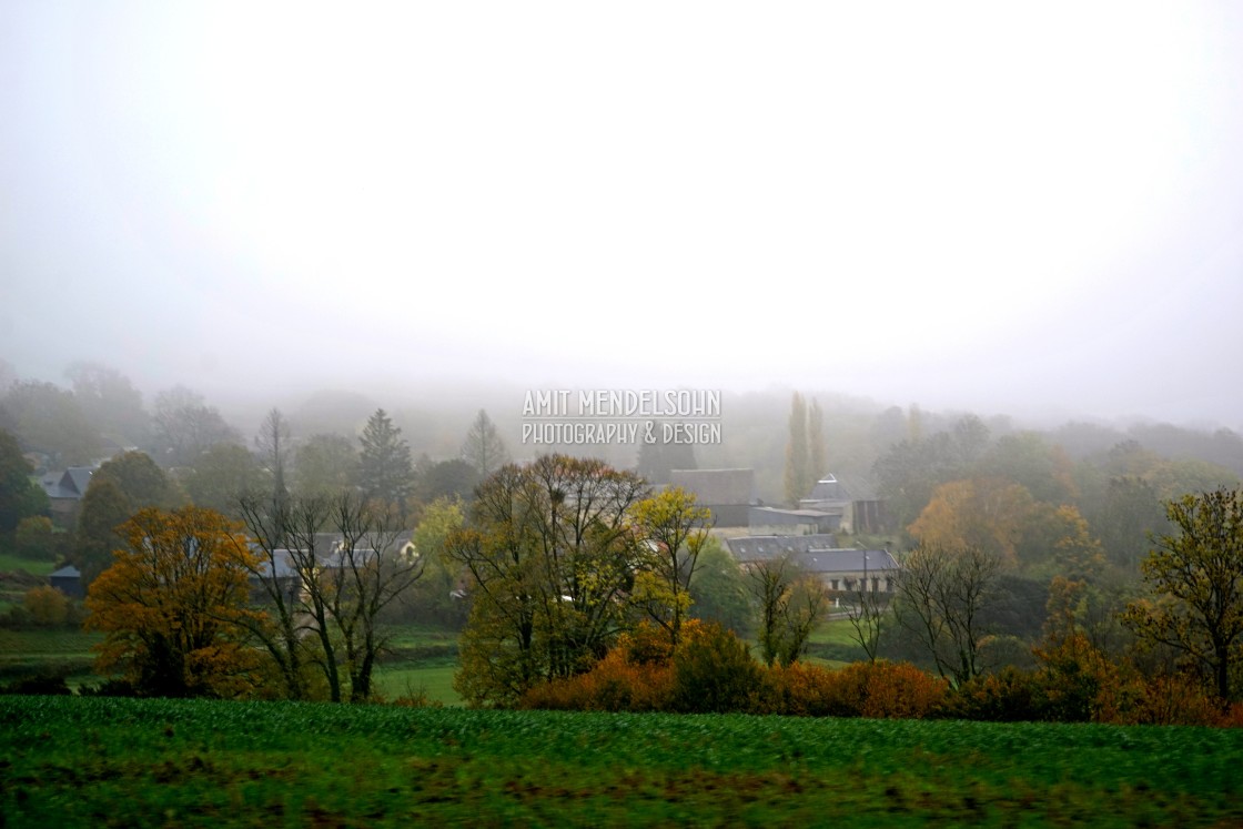 "A village in the fog" stock image