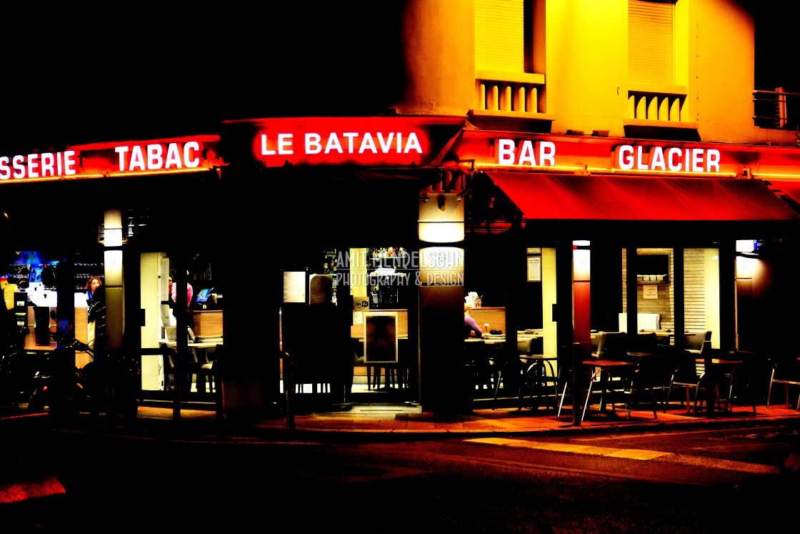 "A bar restaurant at night" stock image