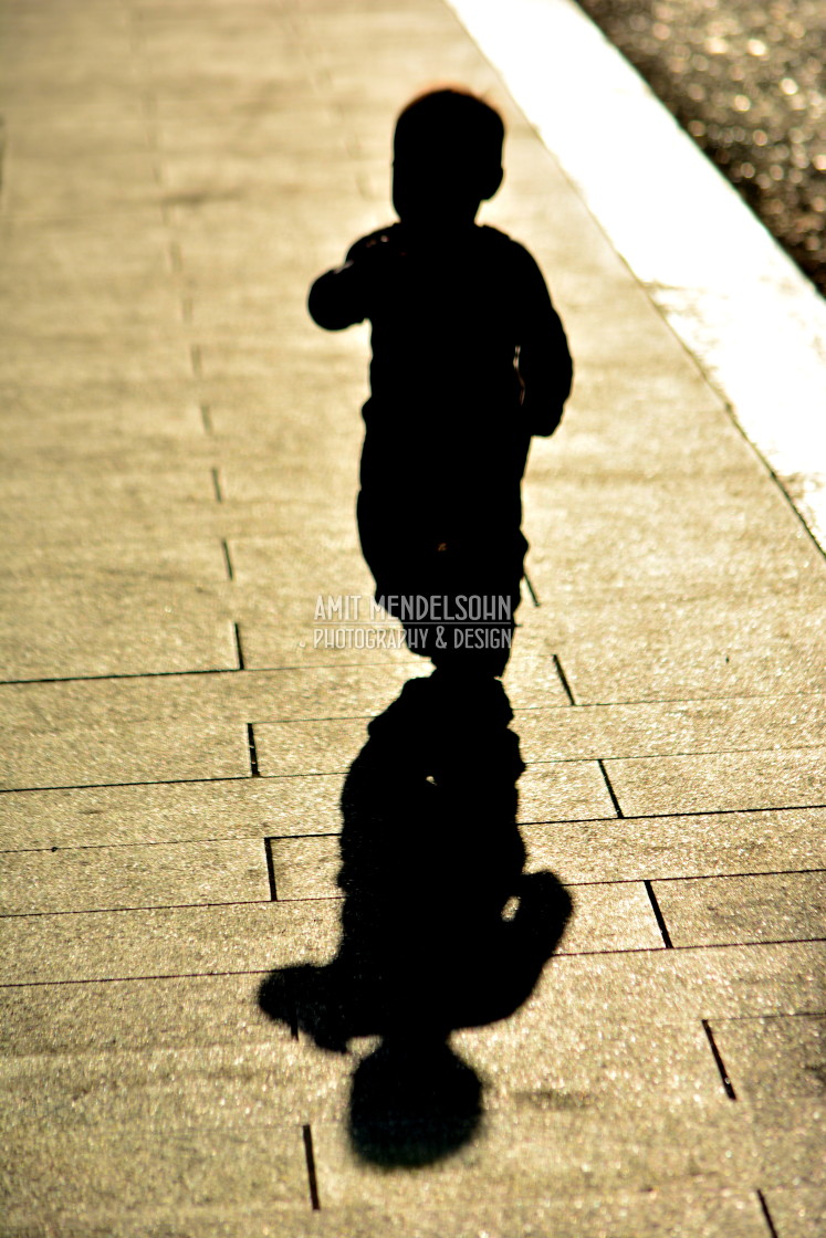 "A silhouette of a baby" stock image