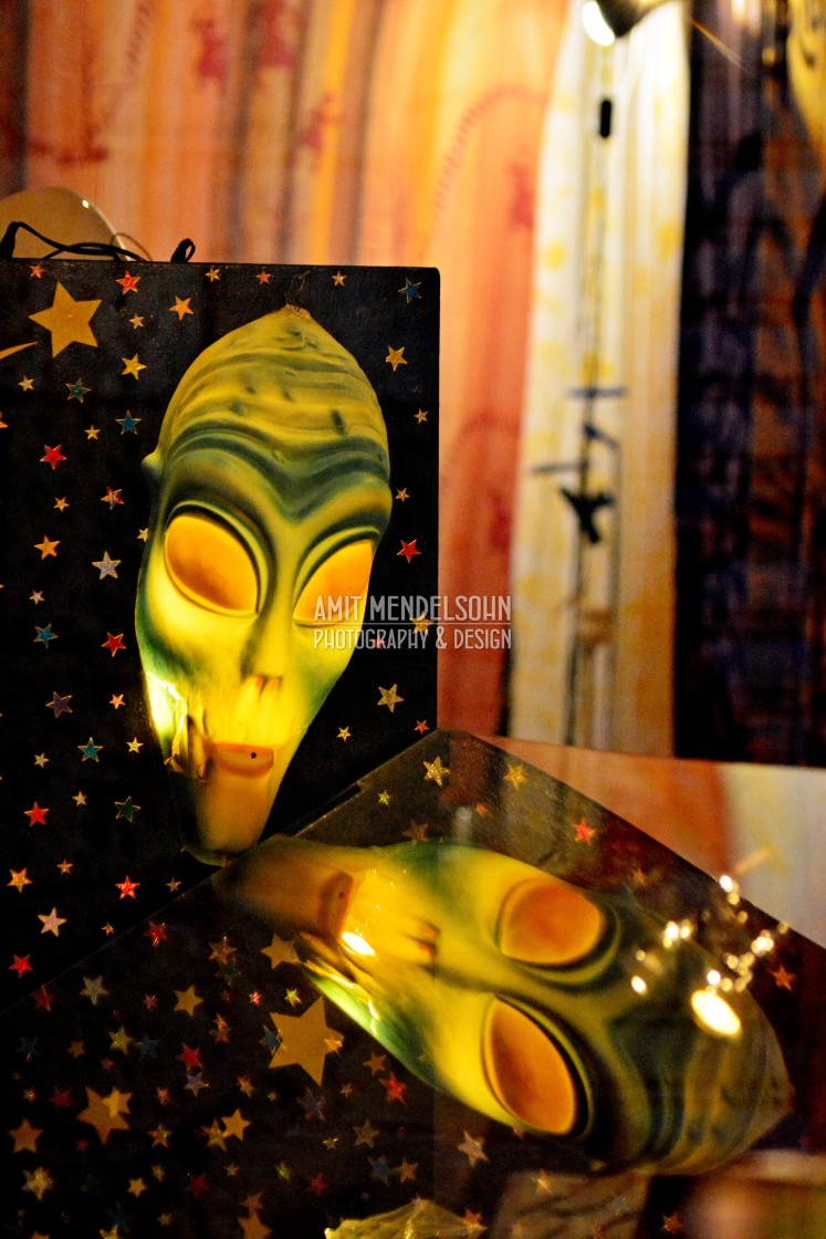 "an alien mask reflecting" stock image