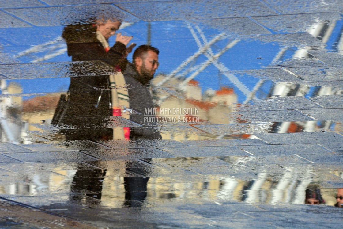 "people reflecting in a pond" stock image