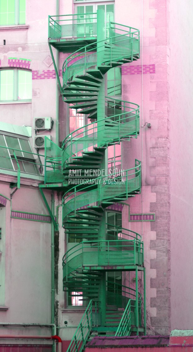 "Green steps on a pink building" stock image