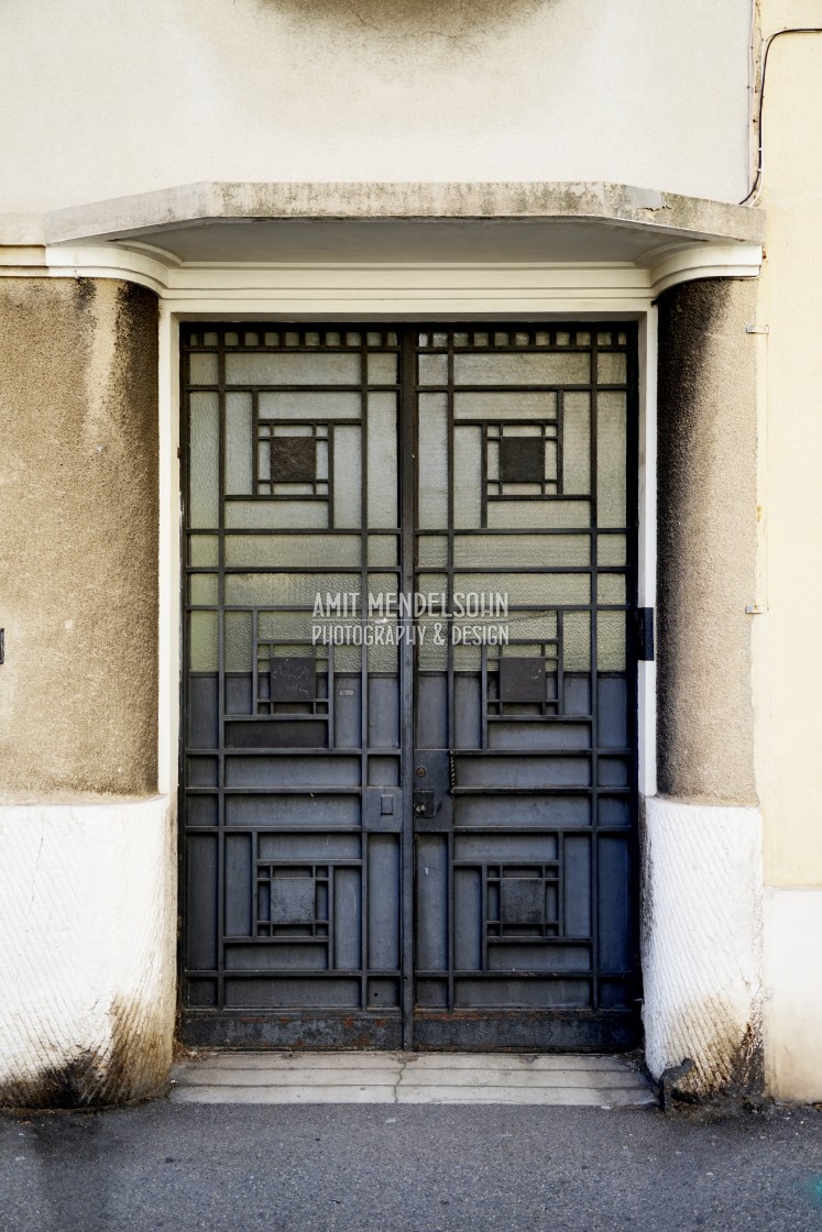 "art deco metal entrance door" stock image