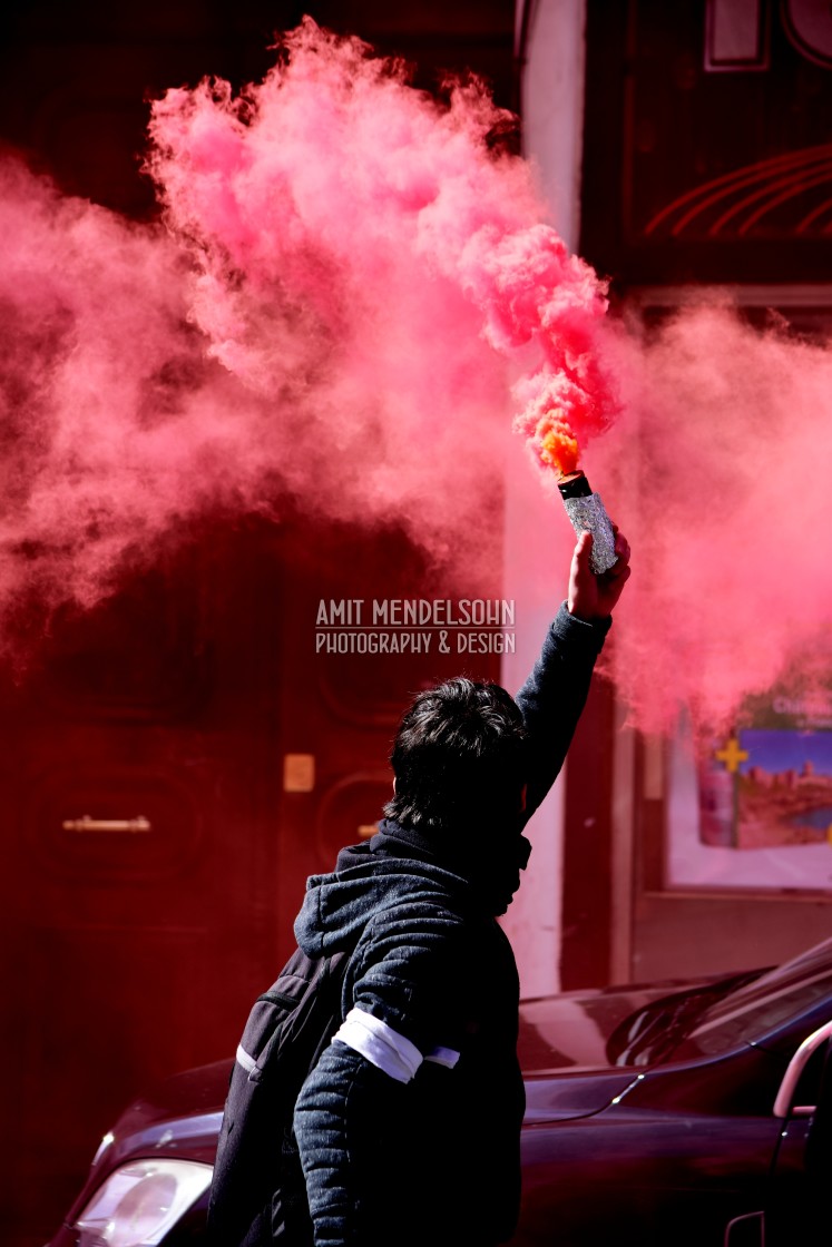 "smoke grenade in a demonstration" stock image