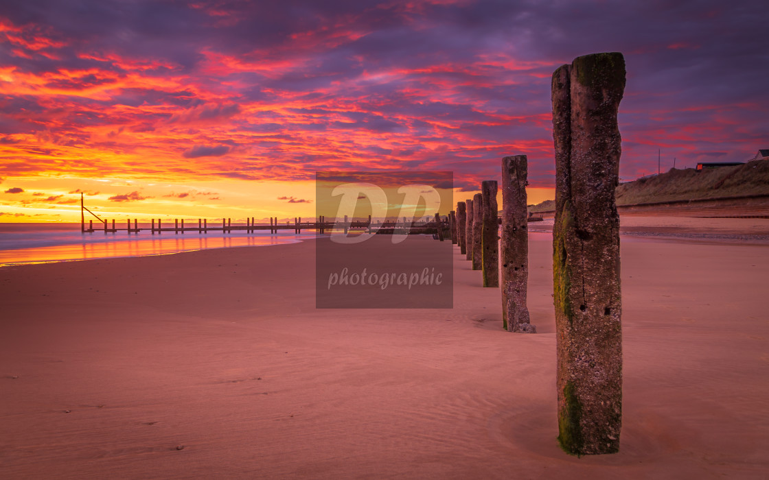 "Sunrise on Happisburgh Beach 6" stock image