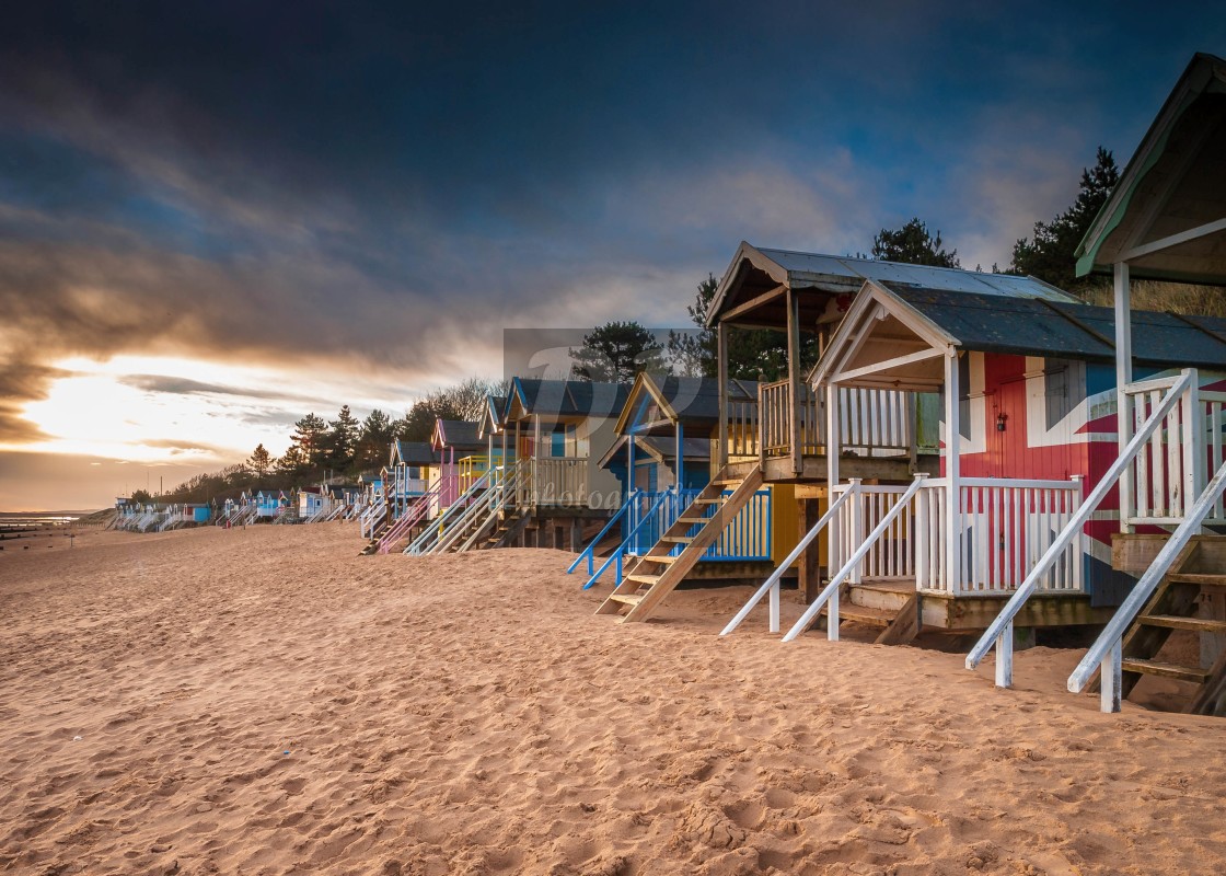 "Beach Huts at Dawn" stock image