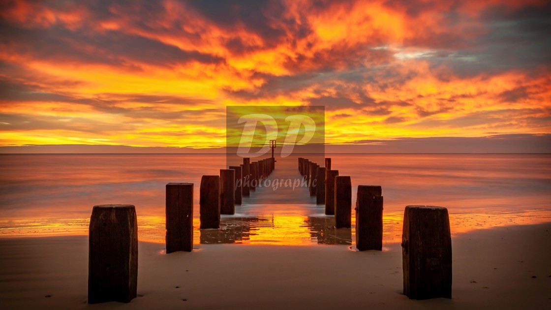 "December sunrise on Lowestoft Beach 1" stock image