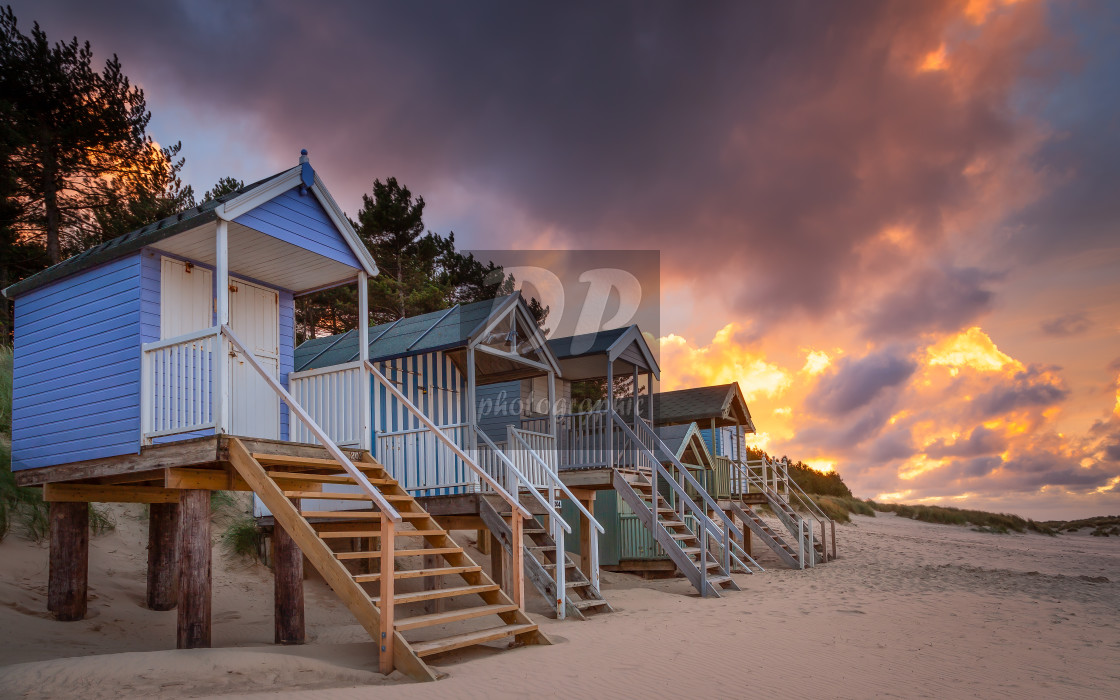 "Beach hut sunset at Well-next-the-sea" stock image