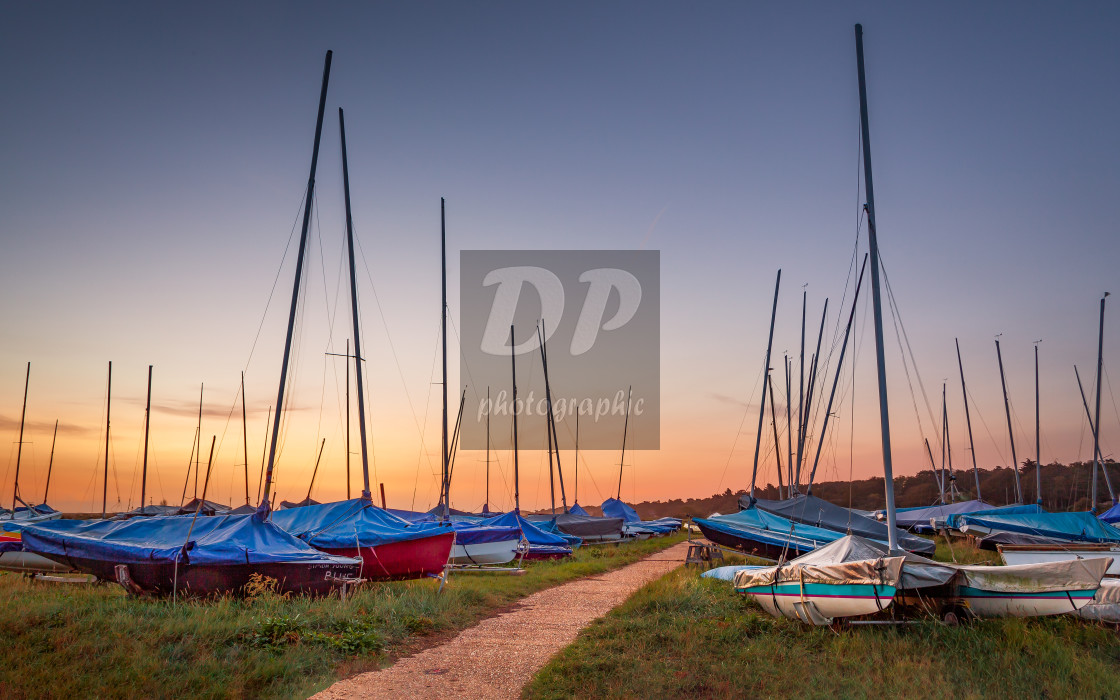 "Blakeney boats at dawn" stock image