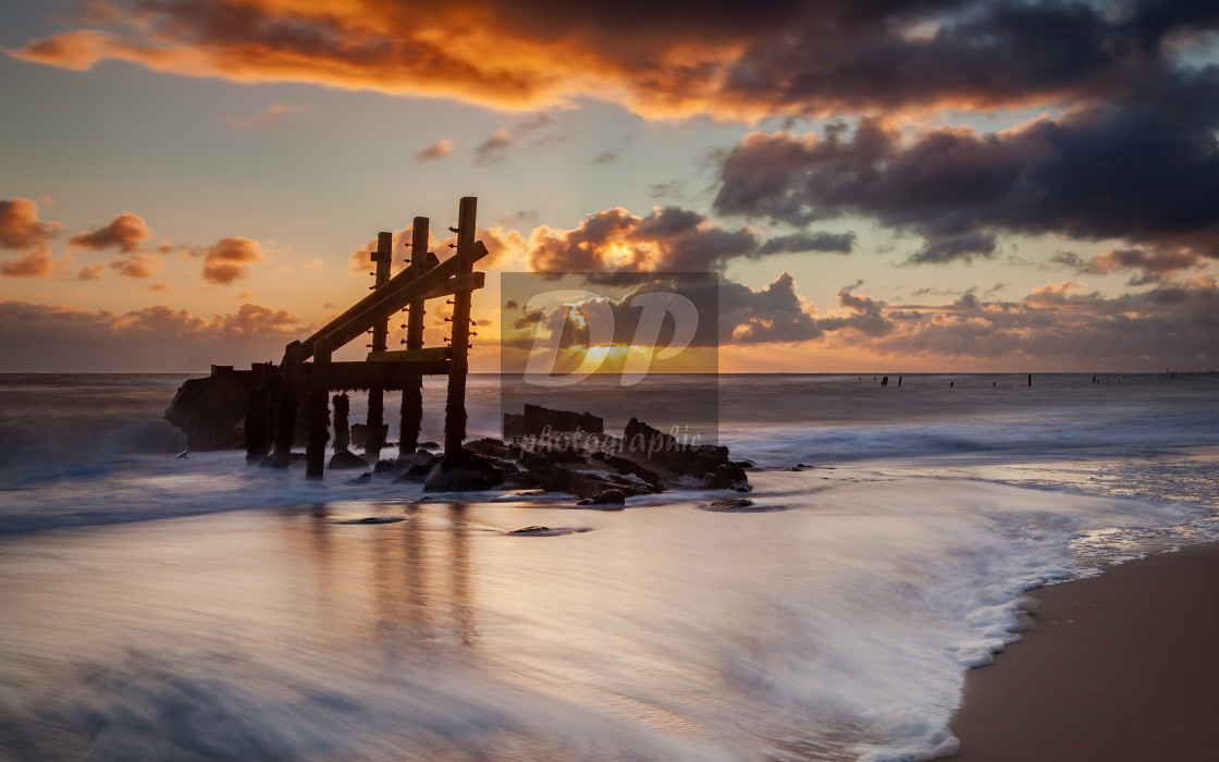 "Happisburgh beach sunrise" stock image