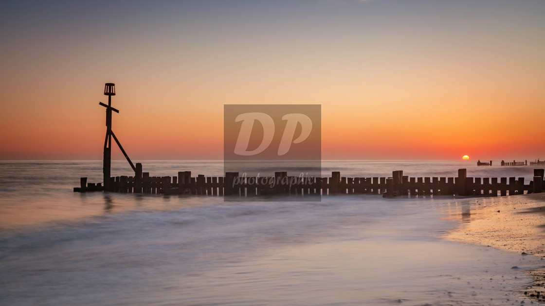 "Winter Sunrise on Walcott Beach" stock image