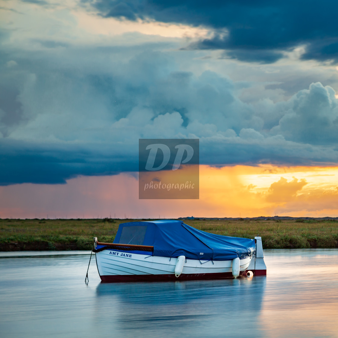 "Blakeney Boat at Sunset" stock image