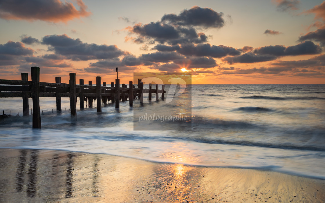 "Sunrise on the beach at Gorleston-on-Sea Norfolk" stock image