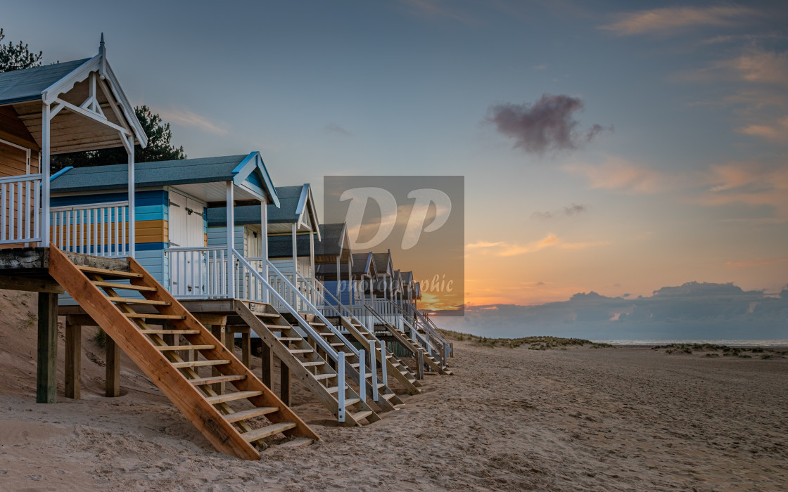 "Beach Hut Sunset at Wells" stock image