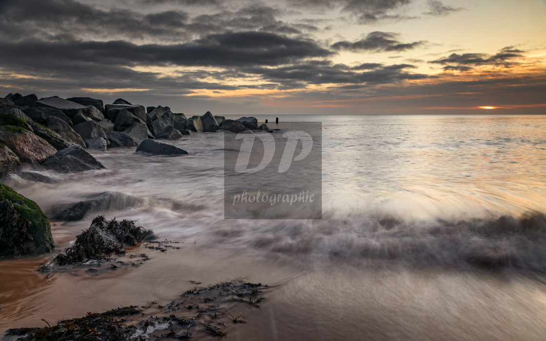 "Winter Sunrise on Hopton Beach Norfolk" stock image