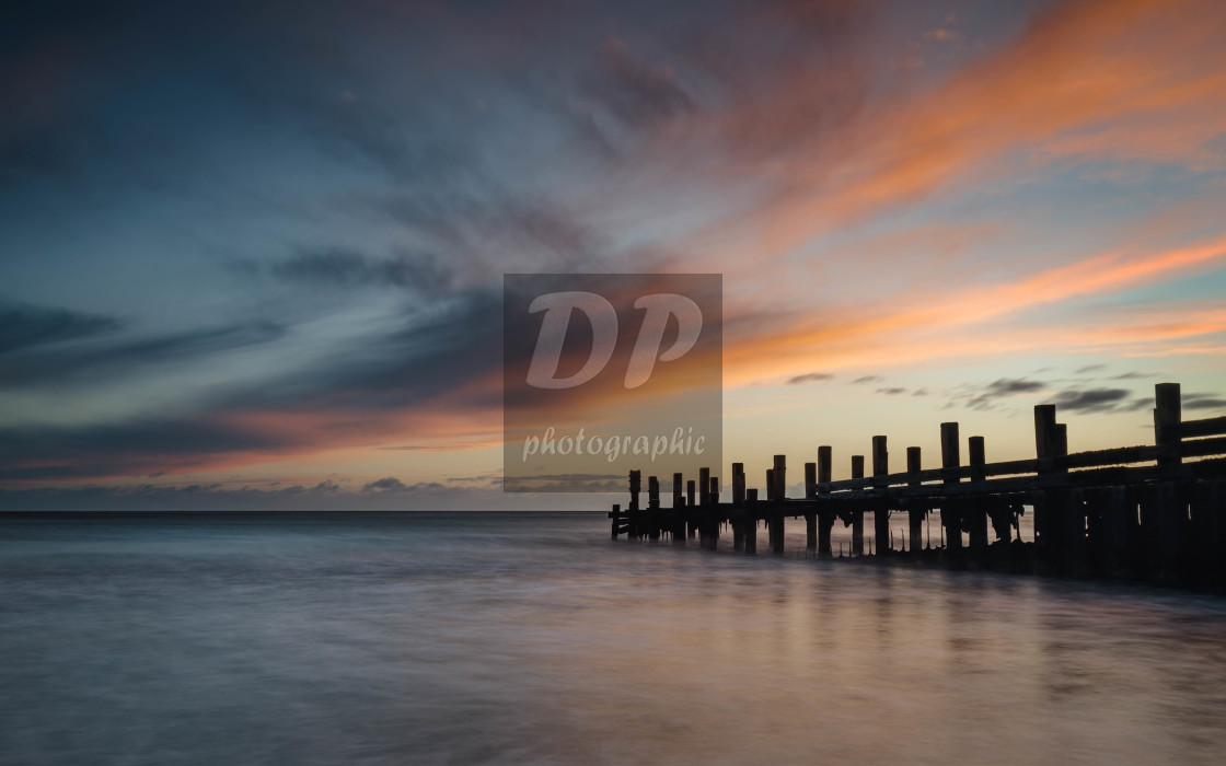 "Dawn Colour on Hopton Beach" stock image