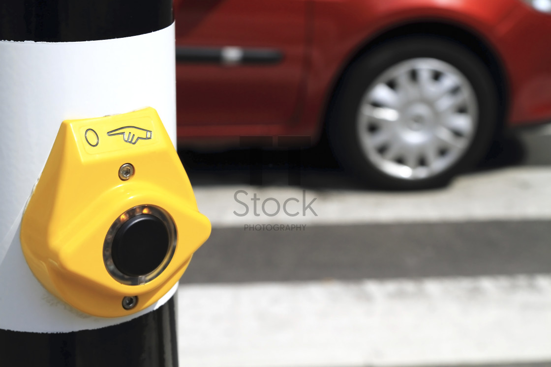 "Yellow crosswalk button red car" by TTStock - $4.88 "Yellow crosswalk button red car" stock image