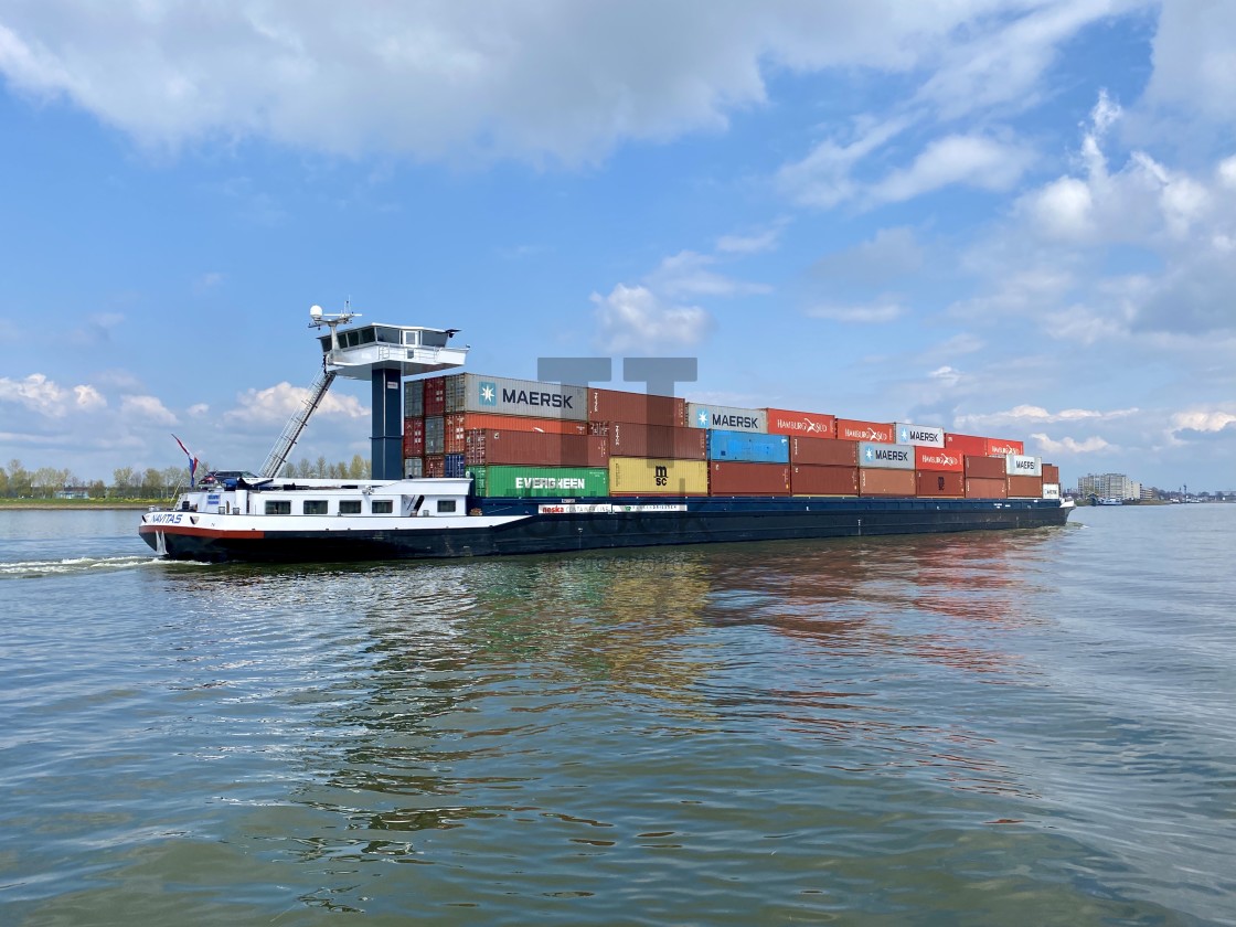 "Inland shipping transport sailing pass Dordrecht 5." by TTStock - $4.90 "Inland shipping transport sailing pass Dordrecht 5." stock image