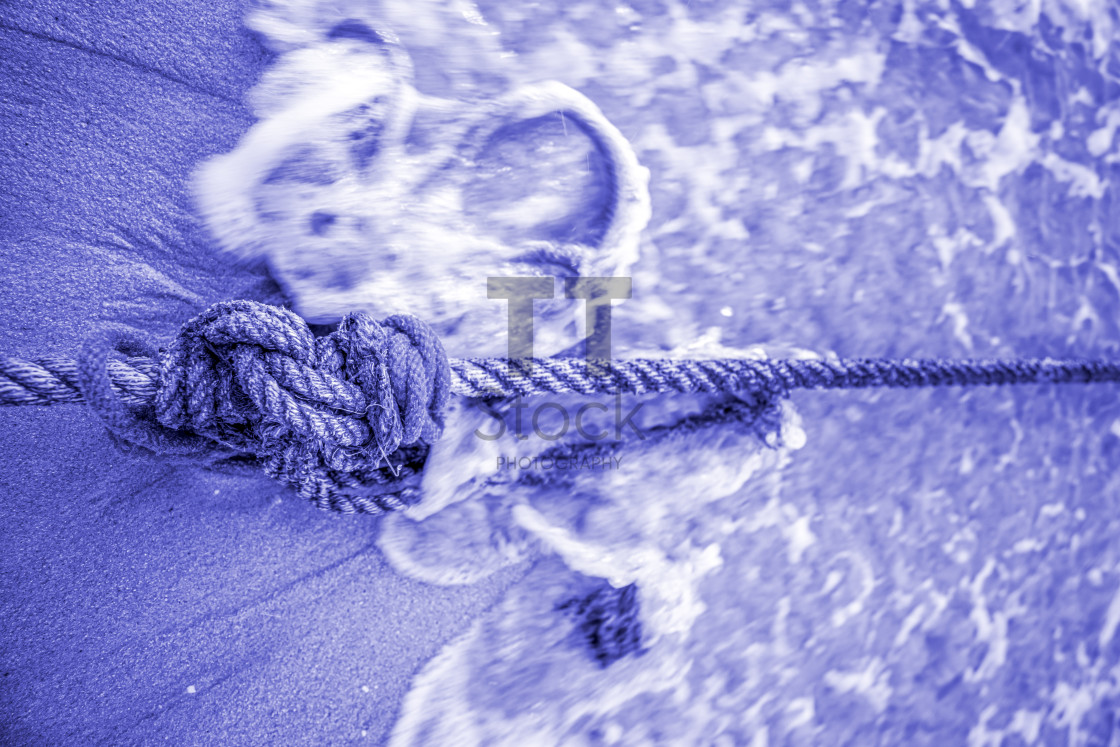 "Ships rope knot on a tropical beach with tidal waves in PANTONE" by TTStock - $4.88 "Ships rope knot on a tropical beach with tidal waves in PANTONE" stock image