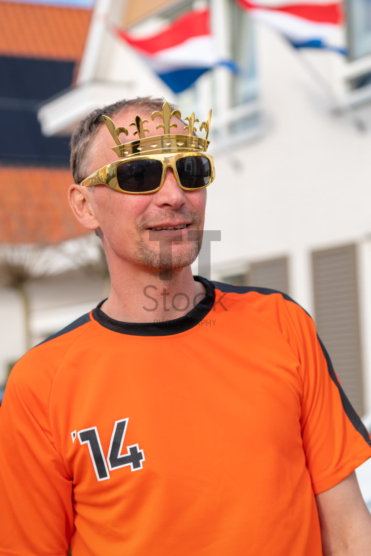 "Oranje Kings day man posing" by TTStock - $4.88 "Oranje Kings day man posing" stock image