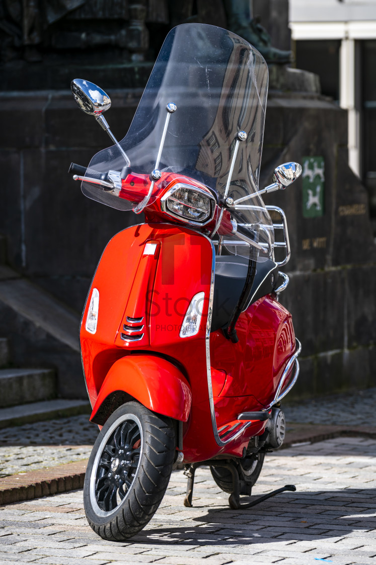 "Parked red vintage style scooter" by TTStock - $4.88 "Parked red vintage style scooter" stock image