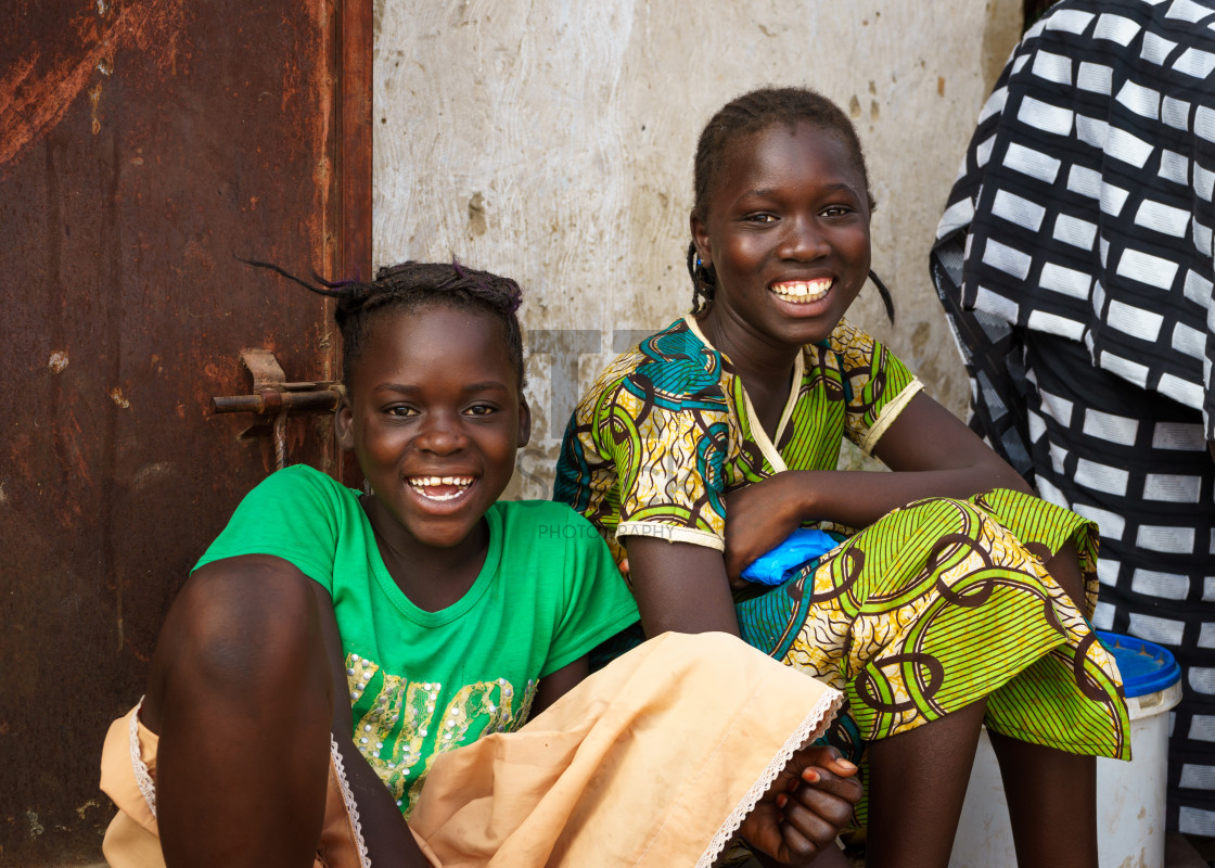 "People of Senegal - Two fun loving girls" by TTStock - $18.36 "People of Senegal - Two fun loving girls" stock image